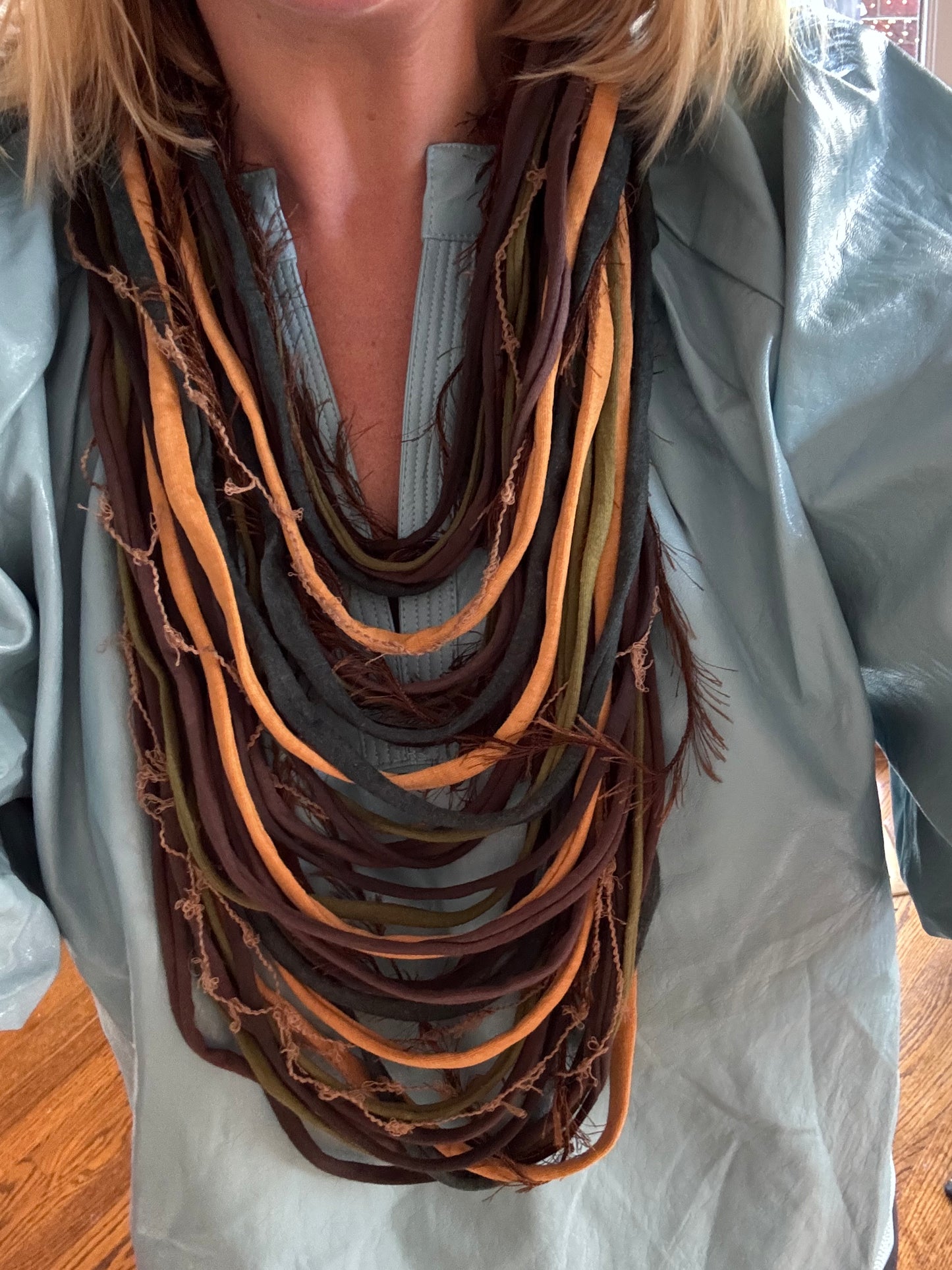 Blue, tans, brown multi layered fringe necklace